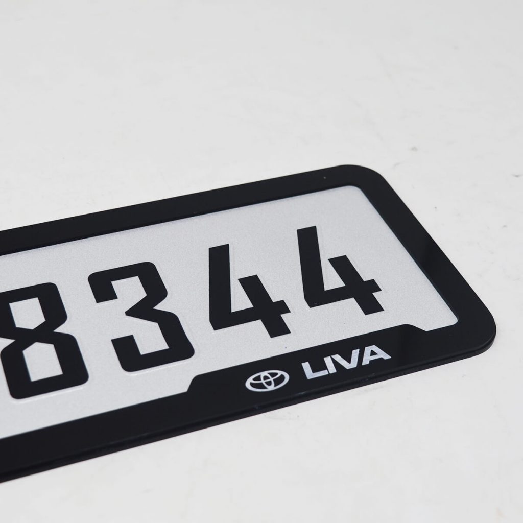 Traffic Sticker Punching Number Plate